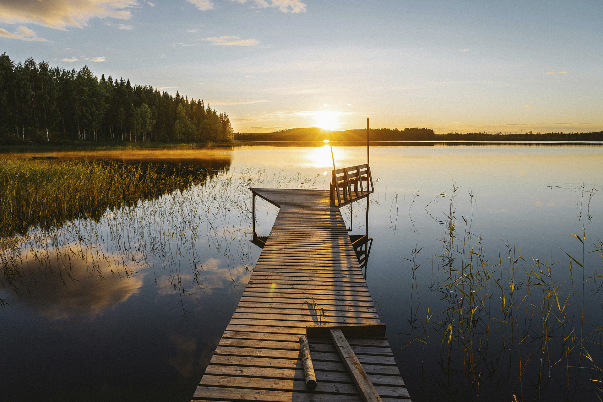 Badbrygga i solnedgång